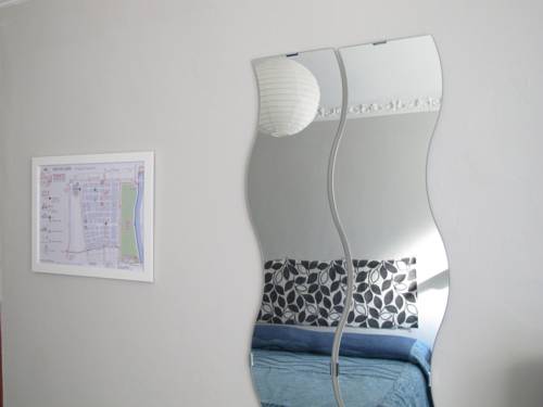 Imagen de la habitación del Hotel Tomato Backpackers. Foto 13