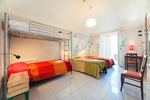 Imagen de la habitación del Hotel Tomato Backpackers. Foto 16