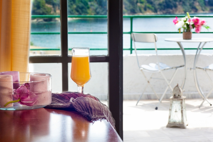 Imagen de la habitación del Hotel Tomato Beach. Foto 8