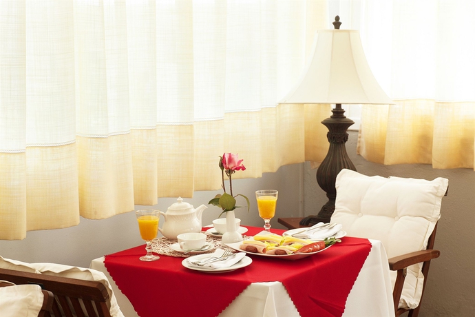 Imagen del bar/restaurante del Hotel Tomato Beach. Foto 3