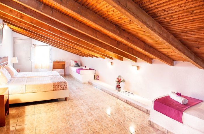 Imagen de la habitación del Hotel Tomato Beach. Foto 11