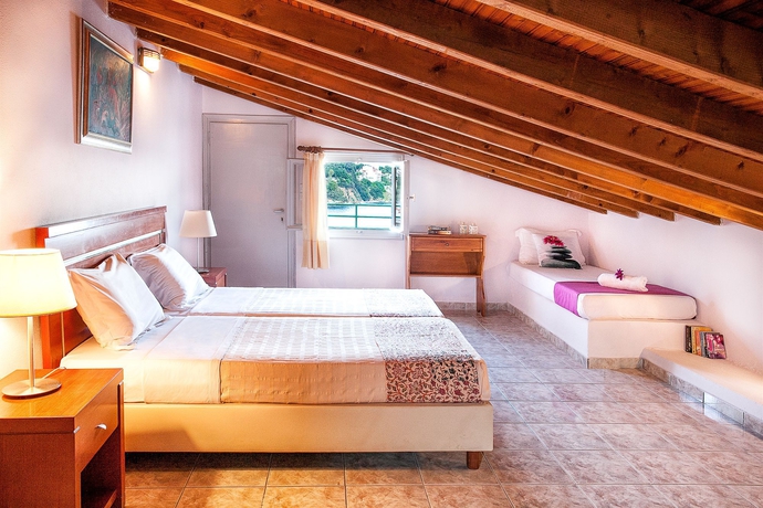 Imagen de la habitación del Hotel Tomato Beach. Foto 12