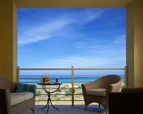 Imagen de la habitación del Hotel Tombolo Talasso Resort. Foto 2