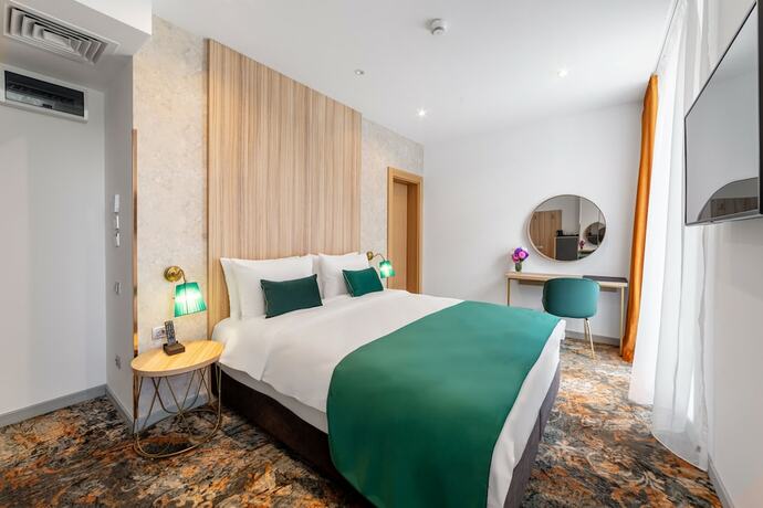 Imagen de la habitación del Hotel Tomis Garden Aparthotel Bucharest. Foto 18