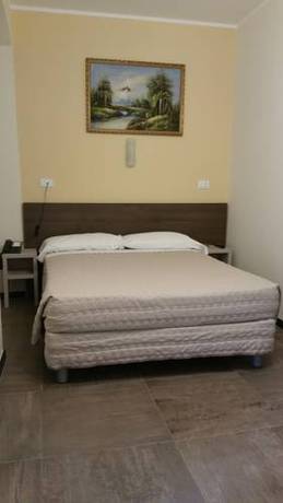 Imagen de la habitación del Hotel Tommaseo. Foto 7