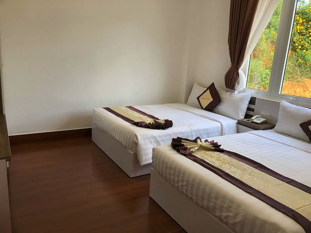 Imagen de la habitación del Hotel Tommy Dalat. Foto 5