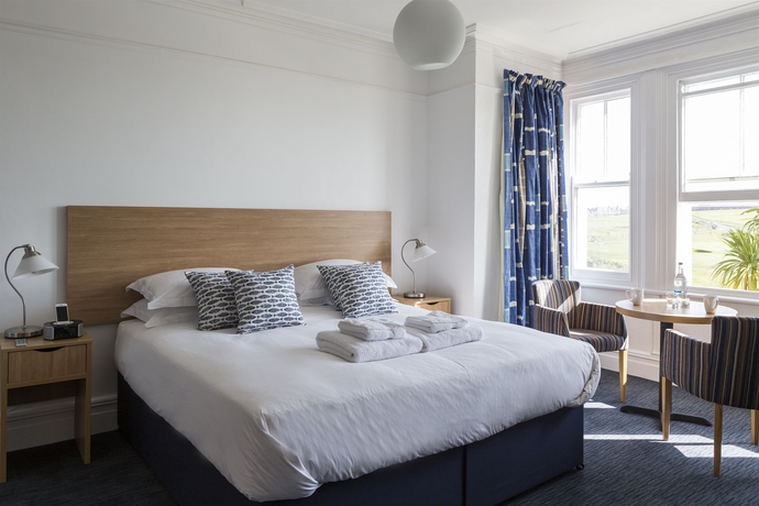 Imagen de la habitación del Hotel Tommy Jacks. Foto 8