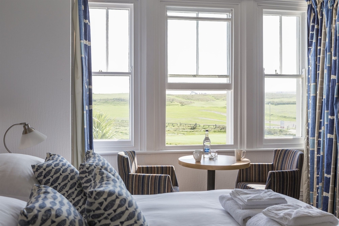 Imagen de la habitación del Hotel Tommy Jacks. Foto 9