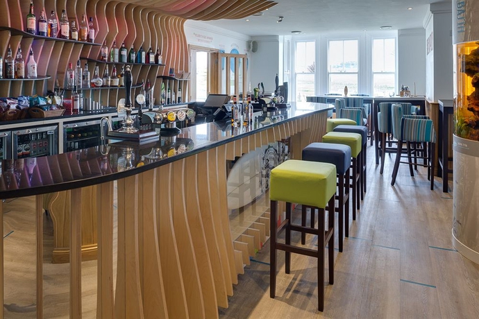 Imagen del bar/restaurante del Hotel Tommy Jacks. Foto 6