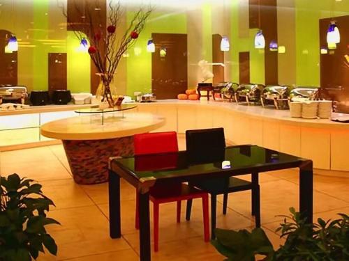 Imagen general del Hotel Tomolo Wuzhan Branch. Foto 8
