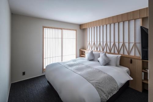 Imagen de la habitación del Hotel Tomoya Residence Kyoto Nijo Takakura. Foto 9