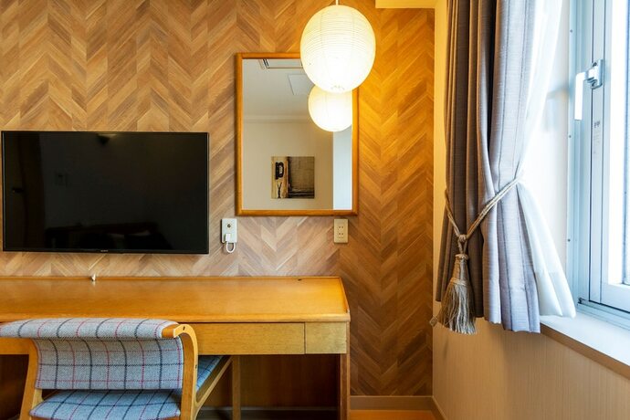 Imagen de la habitación del Hotel Toms. Foto 12