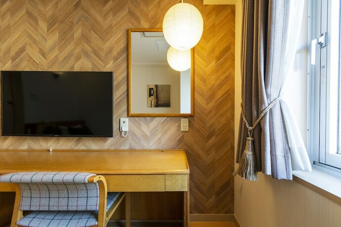 Imagen de la habitación del Hotel Toms. Foto 14