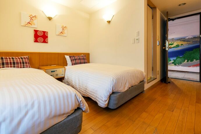 Imagen de la habitación del Hotel Toms. Foto 15