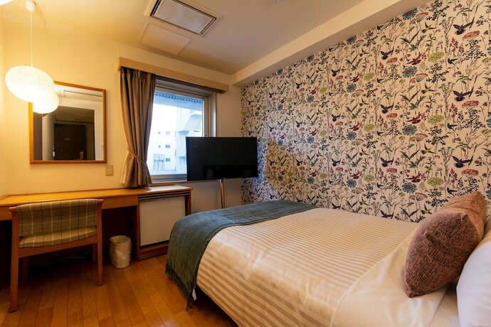 Imagen de la habitación del Hotel Toms. Foto 16