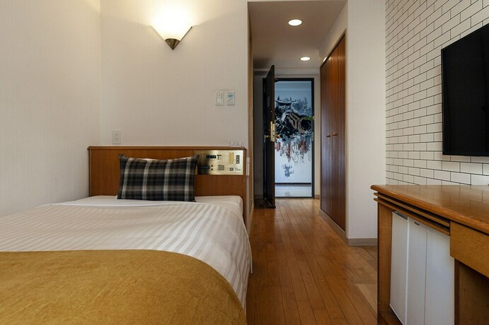 Imagen de la habitación del Hotel Toms. Foto 17