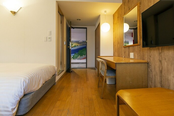 Imagen de la habitación del Hotel Toms. Foto 25