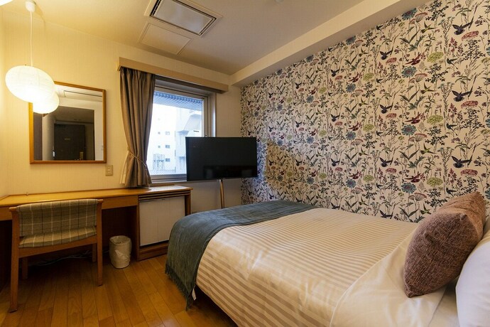 Imagen de la habitación del Hotel Toms. Foto 27