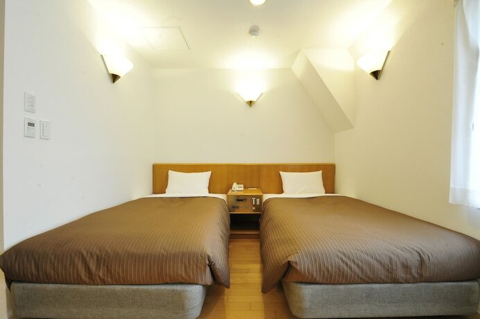 Imagen de la habitación del Hotel Toms. Foto 28