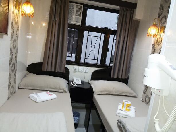 Imagen de la habitación del Hotel Tom\'s Guest House. Foto 13