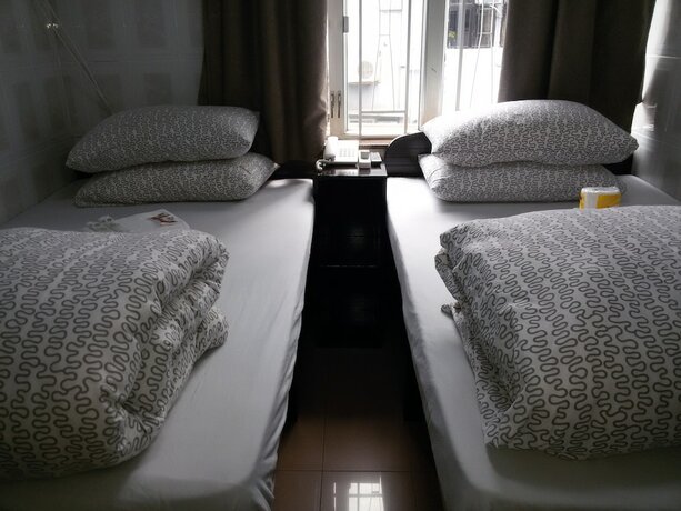 Imagen de la habitación del Hotel Tom\'s Guest House. Foto 14