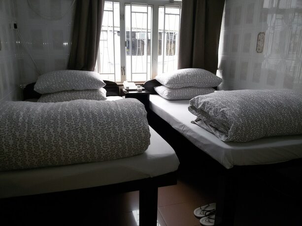Imagen de la habitación del Hotel Tom\'s Guest House. Foto 16