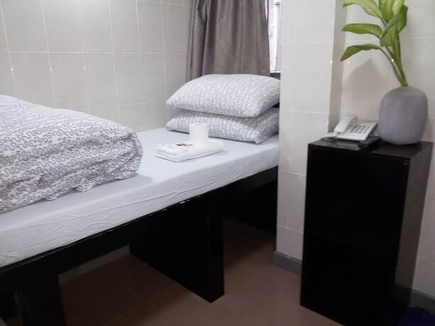 Imagen de la habitación del Hotel Tom\'s Guest House. Foto 18