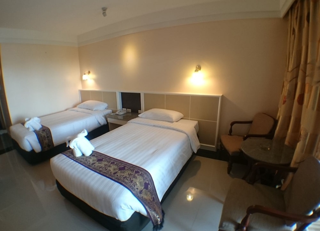 Imagen de la habitación del Hotel Ton Koon. Foto 6