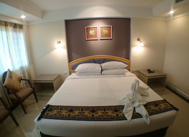 Imagen de la habitación del Hotel Ton Koon. Foto 10