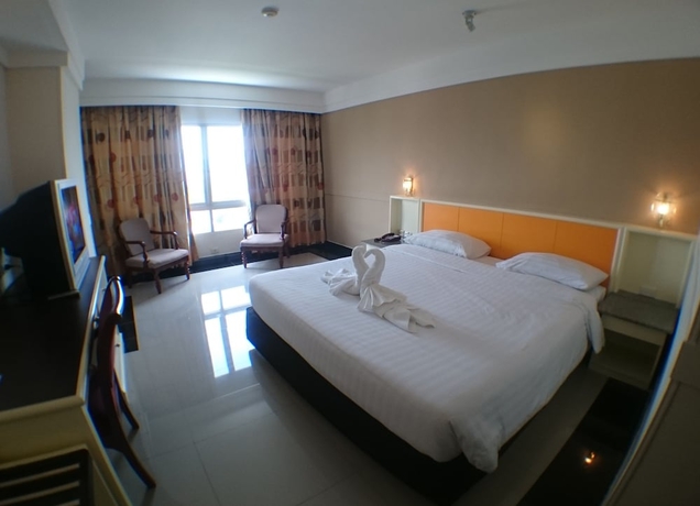 Imagen de la habitación del Hotel Ton Koon. Foto 13