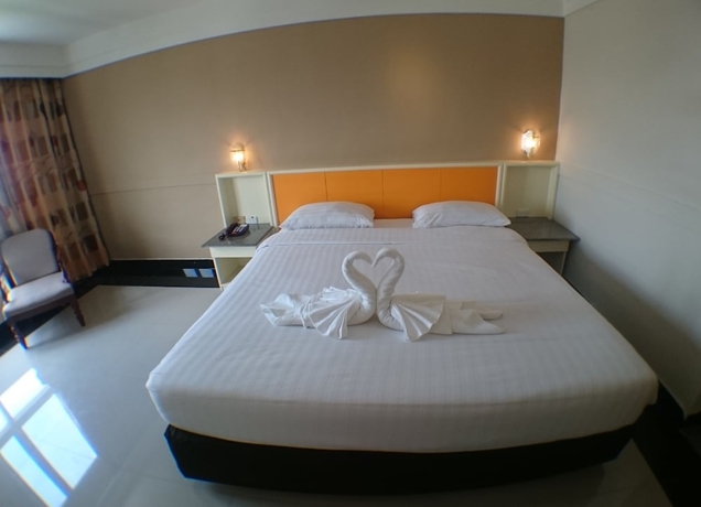 Imagen de la habitación del Hotel Ton Koon. Foto 14