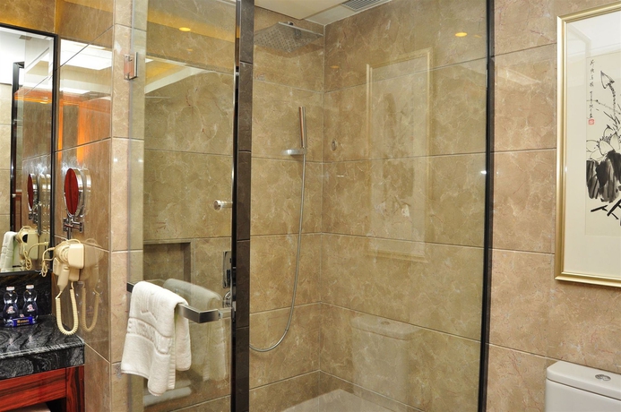 Imagen de la habitación del Hotel Tong Yu International. Foto 5