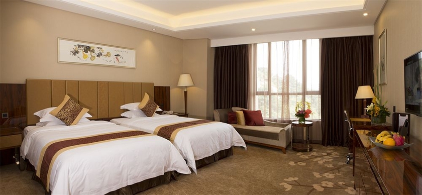Imagen de la habitación del Hotel Tong Yu International. Foto 8