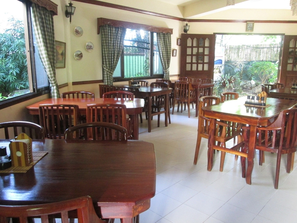 Imagen del bar/restaurante del Hotel Tonglen Eco Resort. Foto 2