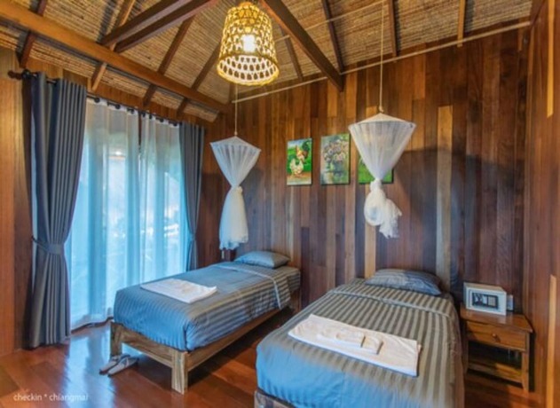 Imagen de la habitación del Hotel Tongna Cottage Natural Resort. Foto 27