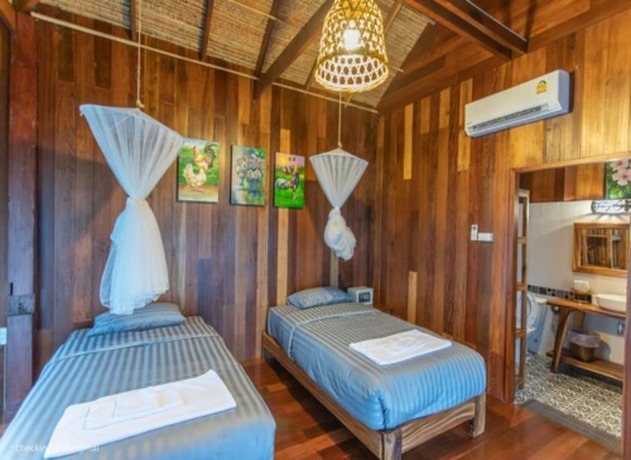 Imagen de la habitación del Hotel Tongna Cottage Natural Resort. Foto 30