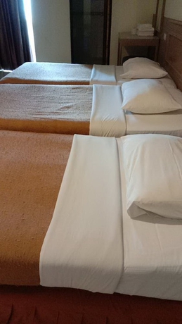 Imagen de la habitación del Hotel Tongpoon. Foto 12