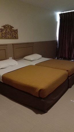 Imagen de la habitación del Hotel Tongpoon. Foto 13