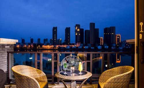 Imagen de la habitación del Hotel Tongquetai New Century Tongling Anhui. Foto 3