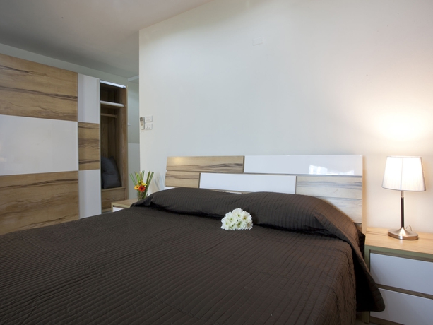Imagen de la habitación del Hotel Tongtip Place. Foto 2