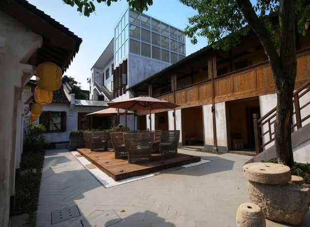 Imagen de los exteriores del Hotel Tongxiang Wuzhen Yuexiang Inn, Tongxiang . Foto 12