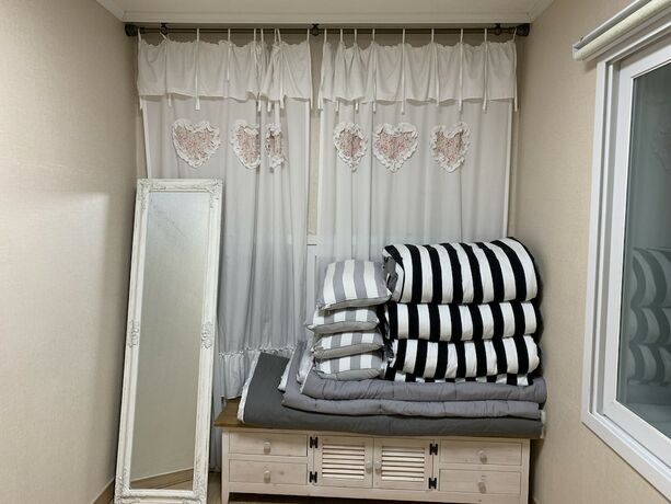Imagen general del Hotel Tongyeong Camellia House. Foto 7