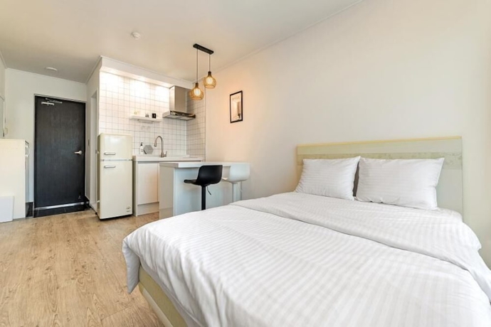 Imagen de la habitación del Hotel Tongyoung Tower Pension. Foto 5