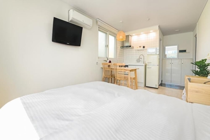 Imagen de la habitación del Hotel Tongyoung Tower Pension. Foto 7