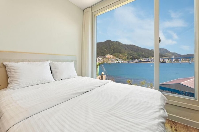 Imagen de la habitación del Hotel Tongyoung Tower Pension. Foto 11