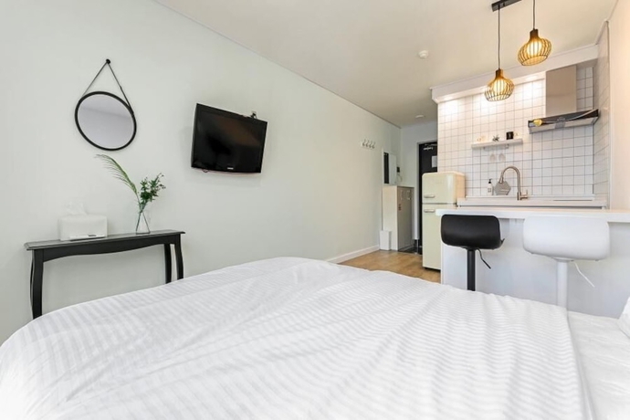 Imagen de la habitación del Hotel Tongyoung Tower Pension. Foto 12
