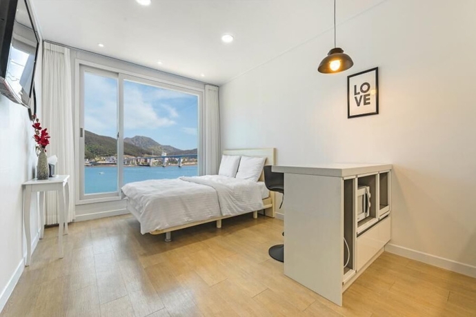 Imagen de la habitación del Hotel Tongyoung Tower Pension. Foto 17