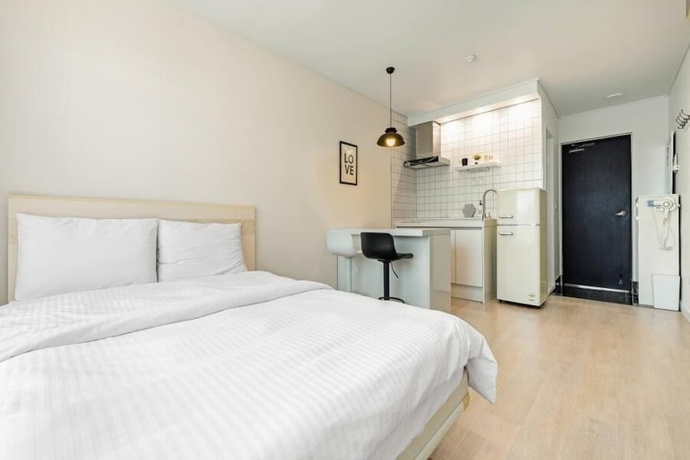 Imagen de la habitación del Hotel Tongyoung Tower Pension. Foto 18