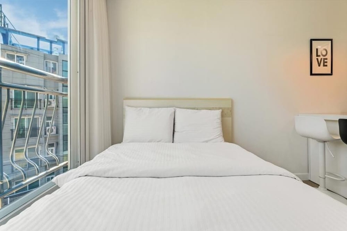 Imagen de la habitación del Hotel Tongyoung Tower Pension. Foto 19