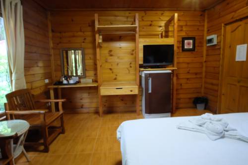 Imagen de la habitación del Hotel Tonsak Resort. Foto 5